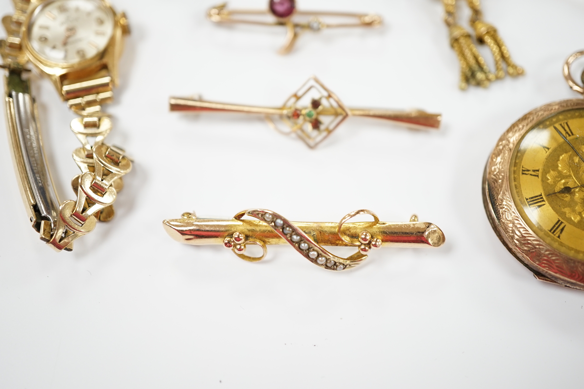 A group of assorted jewellery including a 15ct and single stone amethyst bar brooch, three other yellow metal and gem set bar brooches including two 9ct, a 9ct and enamel brooch, an 18ct watch, a 9ct fob watch and two ot